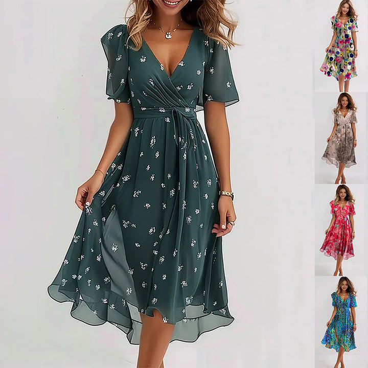 Eye-catching vibrant abstract print midi dress, versatile for day or party wear.