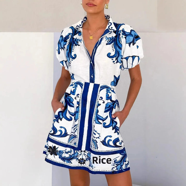 Summer fashion: Women's floral cocktail mini dress with charming puff sleeves.