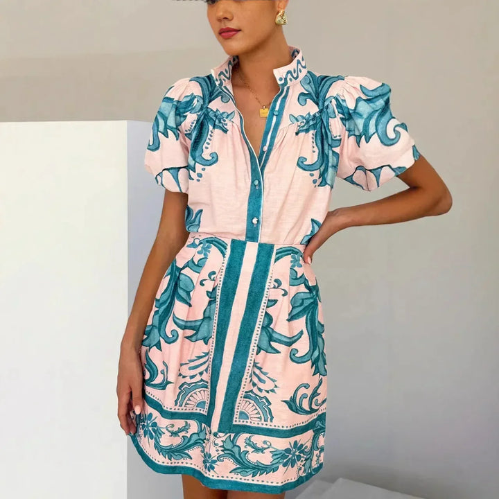 Trendy women's mini dress, vibrant floral pattern, elegant puff sleeves for events.