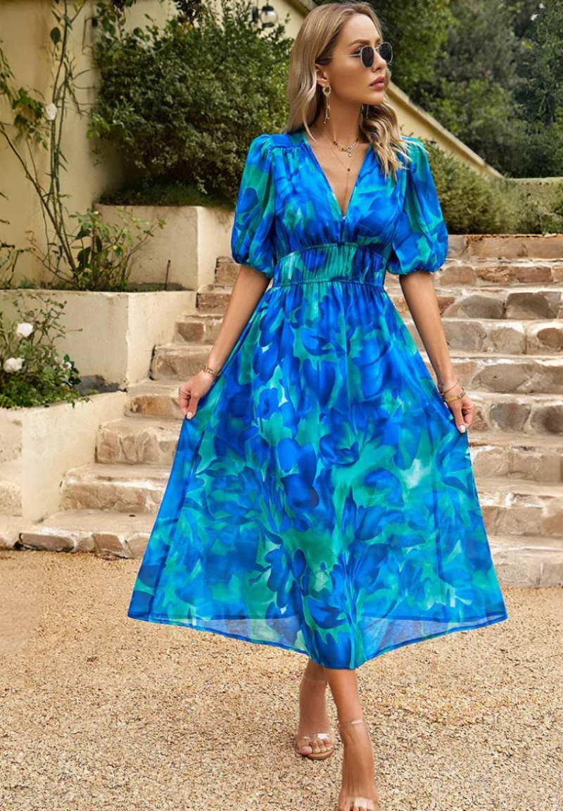 Women's fashion floral midi dress, perfect for summer, with V-neck and tie-waist detail.