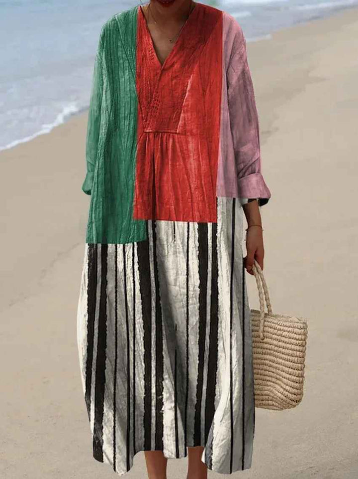 Colorful patchwork print maxi dress for women. Long sleeve V-neck design, perfect for elegant casual summer fashion.