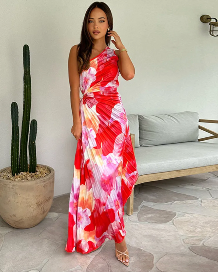 Women's vibrant printed one-shoulder gown, elegant asymmetric hem for wedding guests & evening wear.