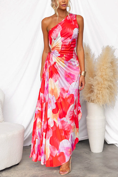 Elegant women's one-shoulder gown with vibrant floral print & asymmetric hem, perfect for summer weddings.