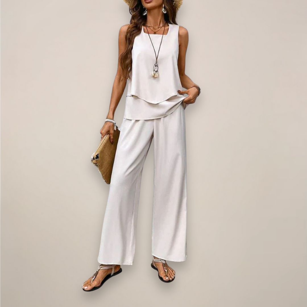 Stylish women's printed two-piece co-ord with wide-leg pants, offering a versatile and relaxed fit.