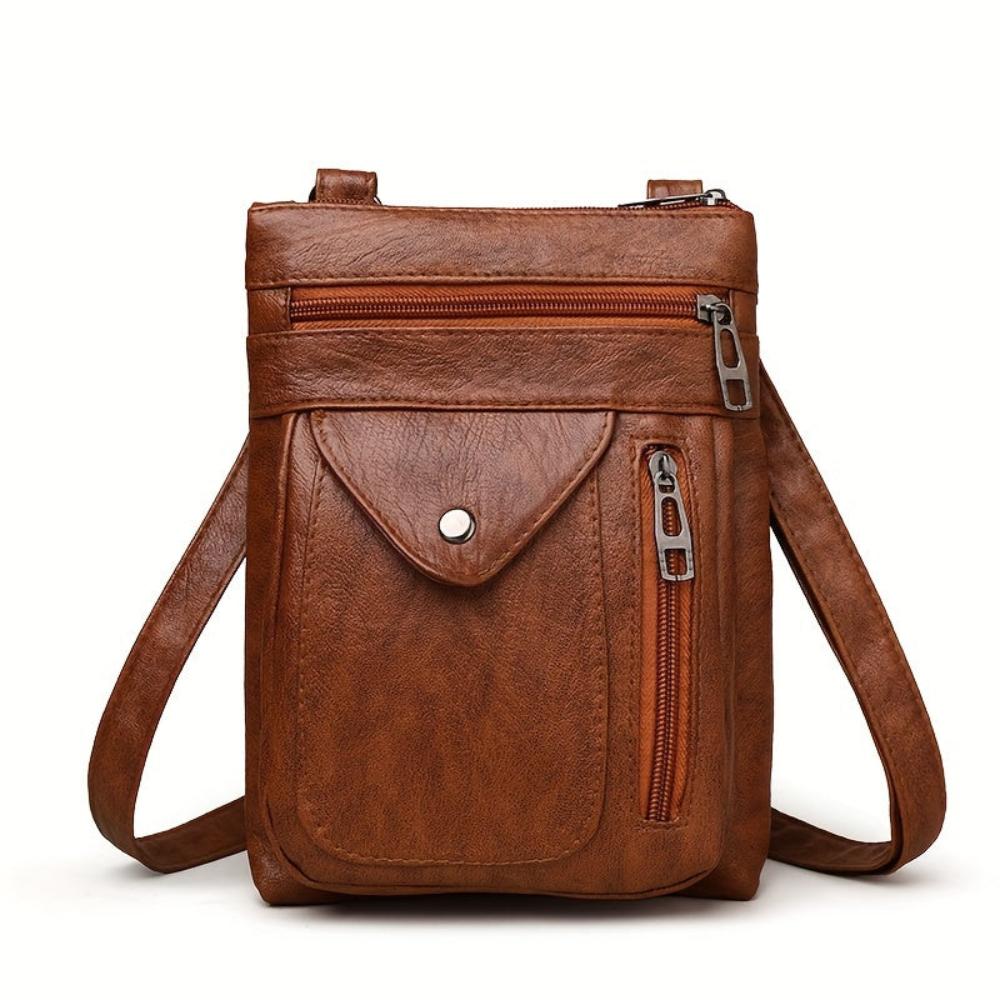 Compact women's vintage shoulder bag with adjustable strap, an everyday fashion accessory.
