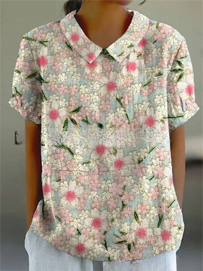 Printed short sleeve floral blouse for women, featuring vintage embroidery, relaxed fit summer top.