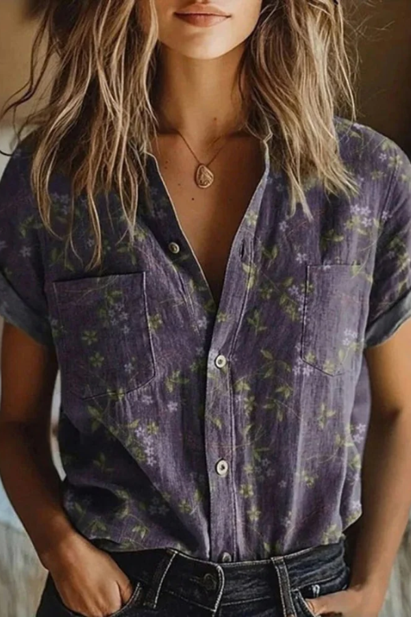 Elegant women's floral button-up blouse with lapel collar, perfect long-sleeve top for everyday, vintage-inspired style.