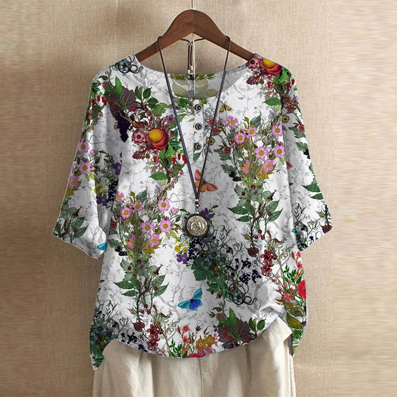Chic women's vintage floral loose fit blouse, artistic print, ideal for bohemian spring fashion.