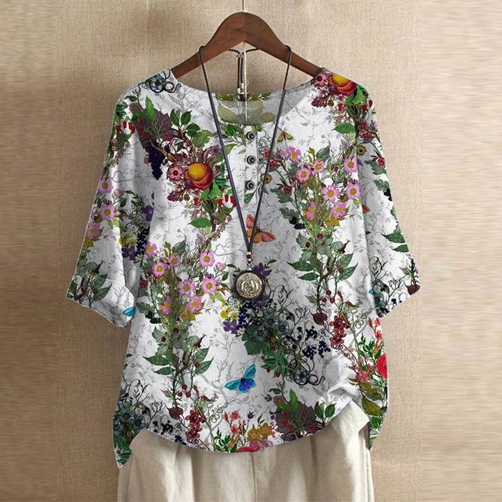 Chic women's vintage floral loose fit blouse, artistic print, ideal for bohemian spring fashion.