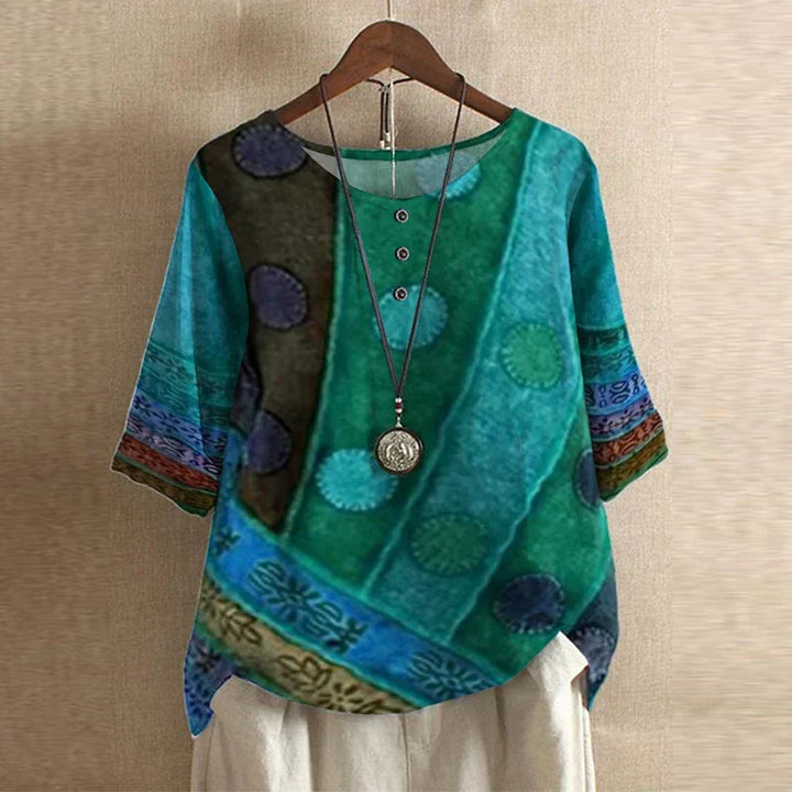 Bohemian style women's blouse with vintage floral print, relaxed fit for casual spring outfits.