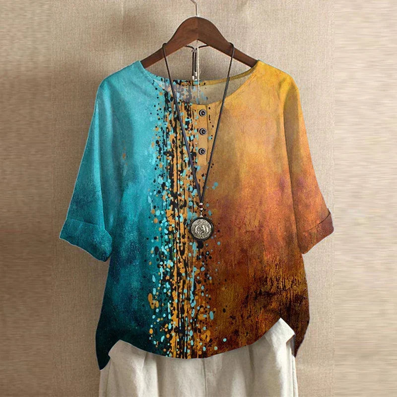 Vibrant floral print women's blouse, relaxed loose fit for chic vintage and bohemian look.
