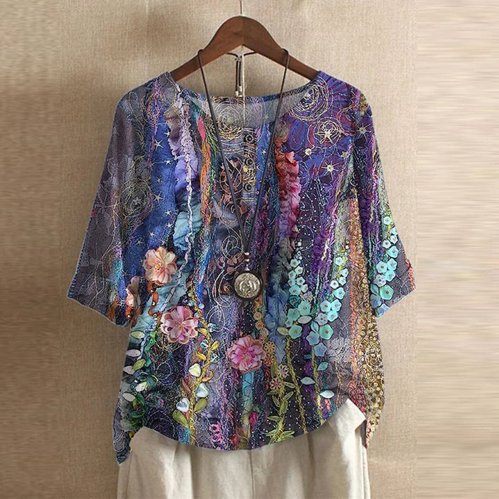Women's vintage floral blouse, versatile loose fit top with bohemian feel for casual spring/summer.