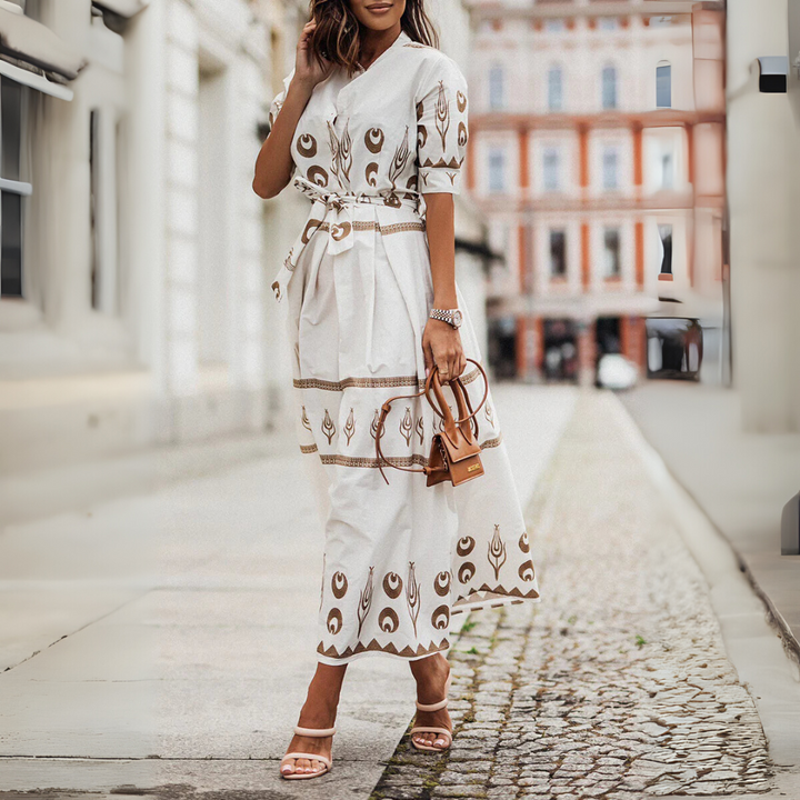 Feminine vintage style A-line dress for women. Short sleeves, tie waist, great for casual spring & summer fashion.