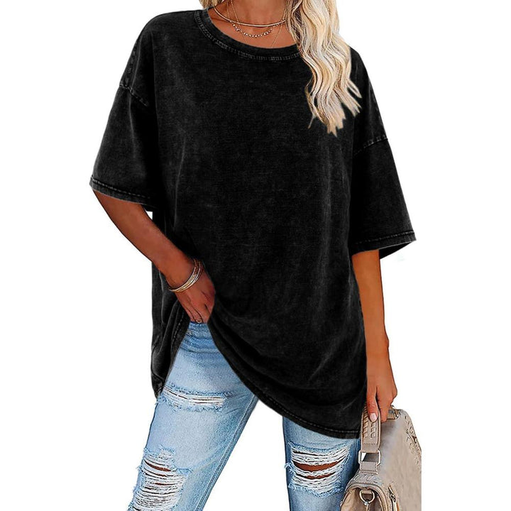 Short sleeve women's vintage top, oversized and relaxed fit for retro casual style.