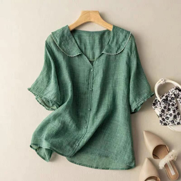Peach vintage scalloped collar blouse for women, button-down design. A versatile and modern classic top.