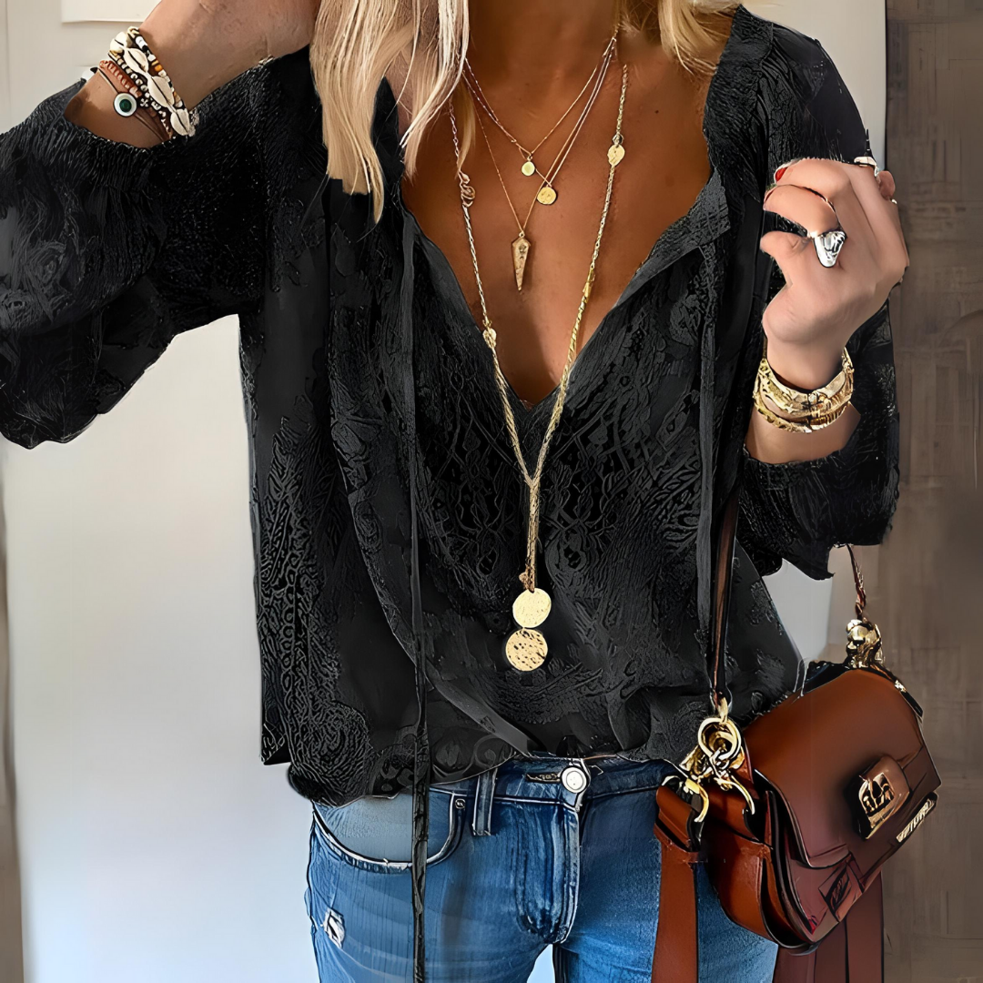Black women's vintage split neck blouse. Versatile bohemian top, great for casual elegance in spring/summer.