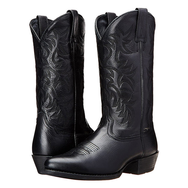 Fashionable black cowboy boots for women, featuring detailed embroidery and a classic Western vintage design.