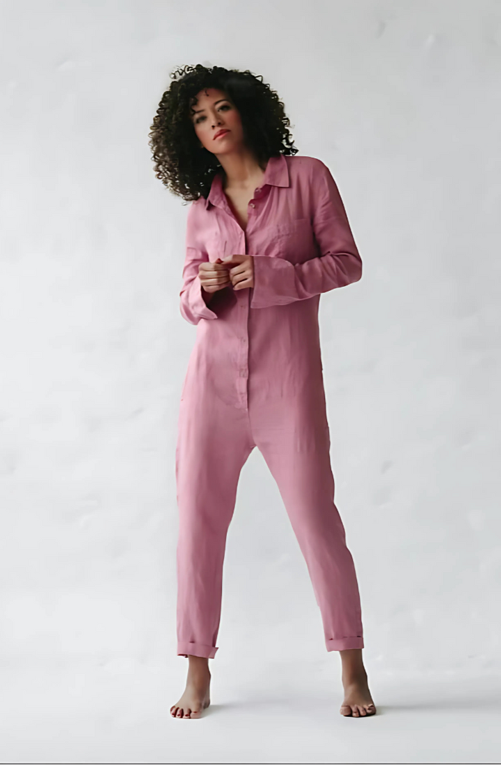 Relaxed fit women's jumpsuit, vintage style. Ankle length, button closure, & practical pockets for effortless wear.