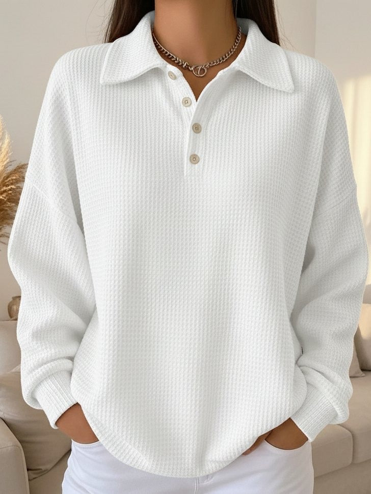 Versatile women's waffle knit henley sweater. Collared, long sleeve, perfect everyday top for autumn casual wear.