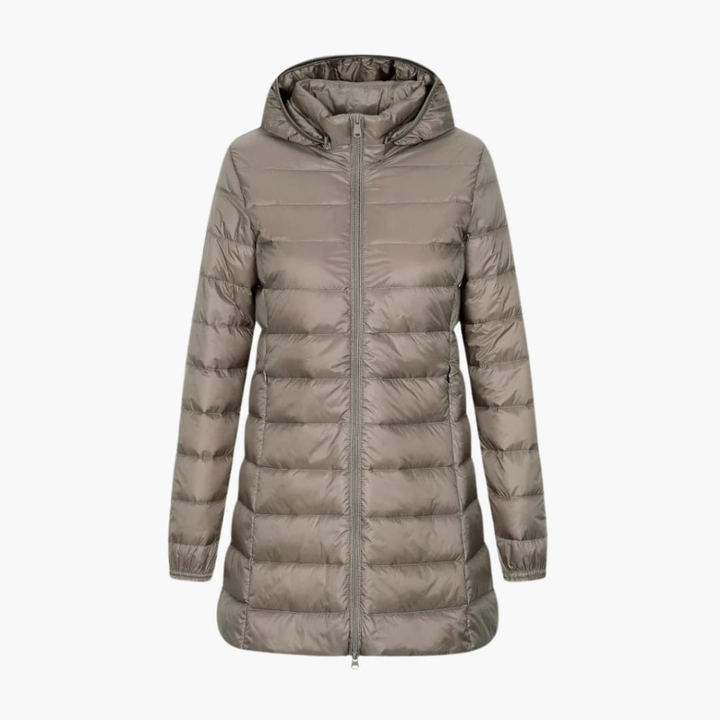 Stylish plus size women's long quilted winter coat, warm and comfortable for cold weather.