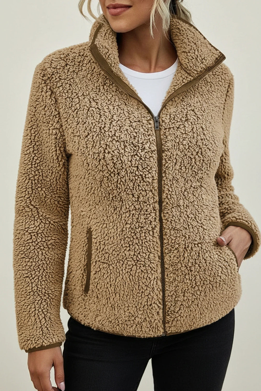 Women's warm winter jacket, relaxed fit with a stylish stand collar. Ideal cozy zip-up outerwear.