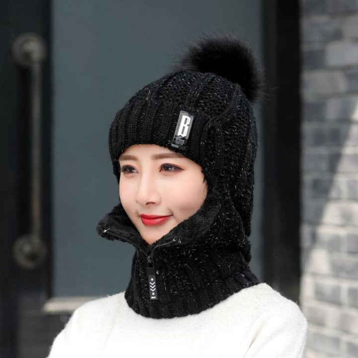 Model wearing a black women's warm winter windproof hat, showcasing fit and warmth