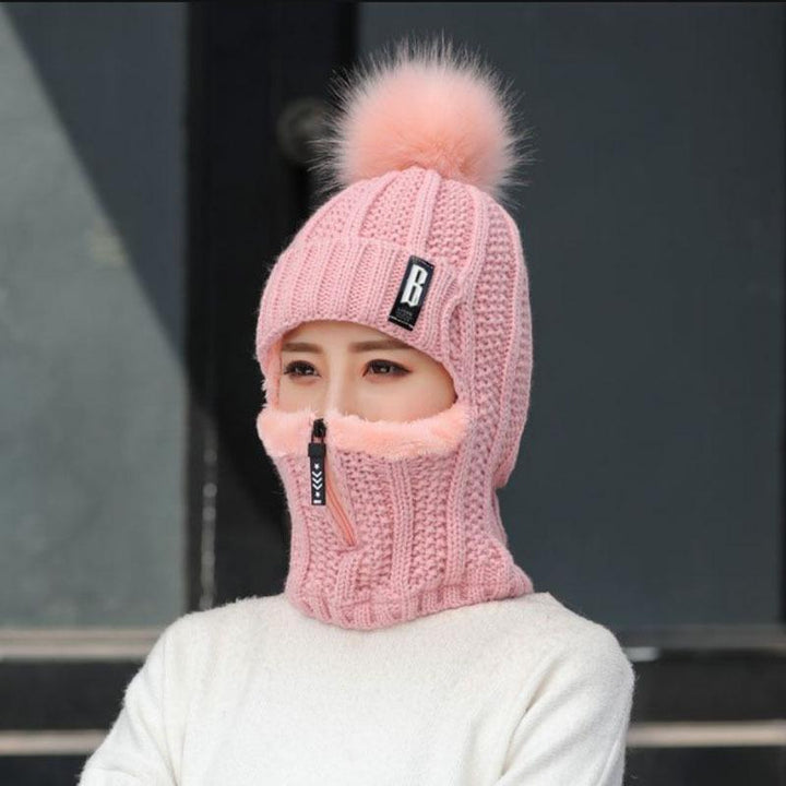 Front view of a stylish women's knit winter hat, perfect for warmth and wind protection