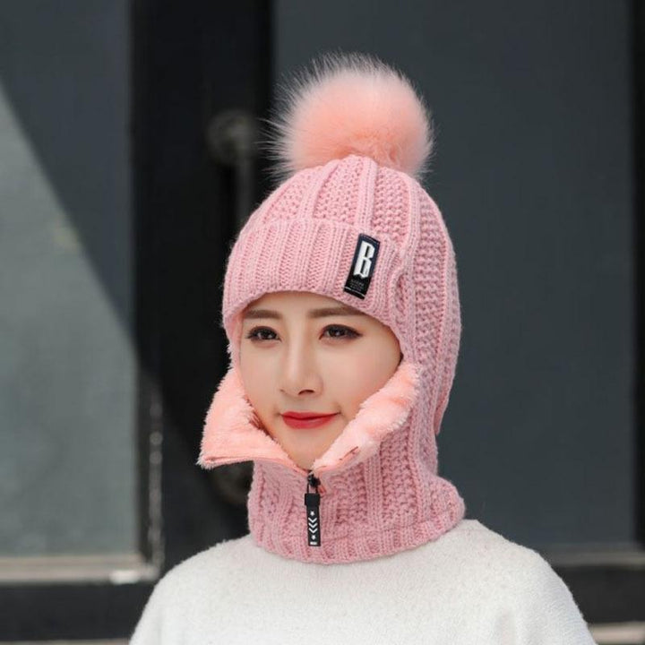 Back view of a women's cozy knit winter hat, emphasizing its full head coverage and warmth