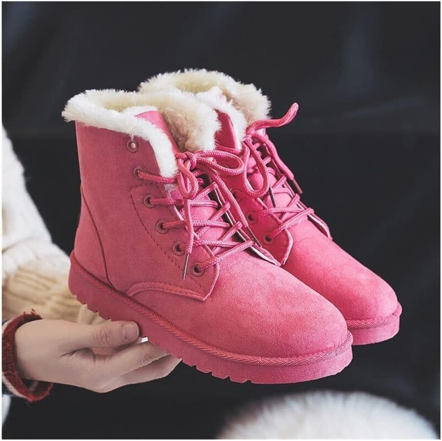 Fashionable women's winter boots, ankle height, with secure lace-up closure for warmth and support.
