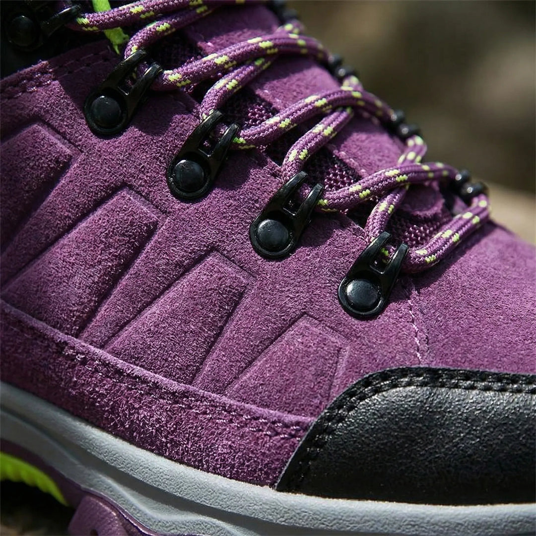 All-weather women's outdoor shoes with a rugged sole & water-repellent design for ultimate trail comfort.