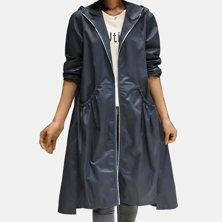 Versatile women's water-resistant rain jacket. Hooded, knee-length, lightweight outerwear for spring & fall adventures.