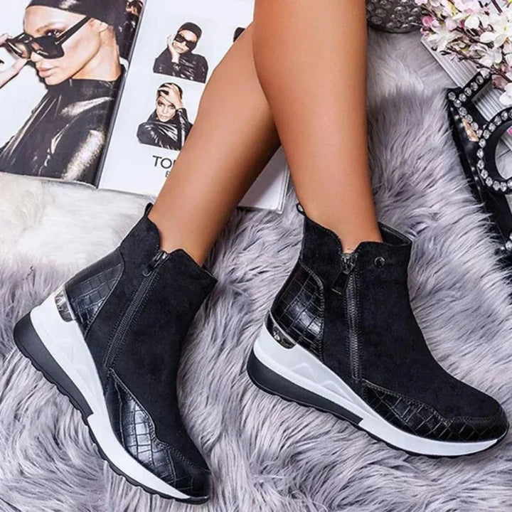 Comfortable women's waterproof ankle boots, ideal for everyday wear. Stylish design for all weather.