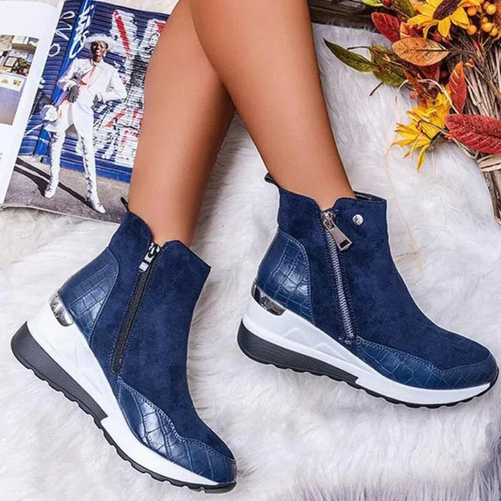 Durable women's waterproof ankle boots. Keeps feet warm and dry in cold, wet winter conditions.