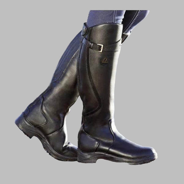 Comfortable women's tall riding boots with adjustable fit, waterproof protection, and secure grip for equestrian sport.