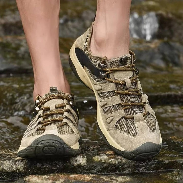 Women's waterproof hiking shoes for all-terrain traction, durable outdoor trail footwear.