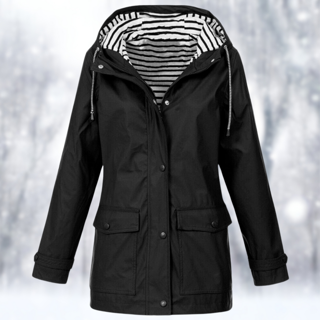 Women's waterproof hooded raincoat for all-weather protection. Lightweight, ideal for outdoor travel.