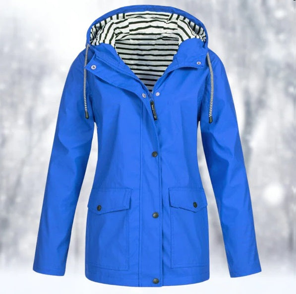 Durable women's waterproof jacket with hood, offering all-weather protection for outdoor activities.