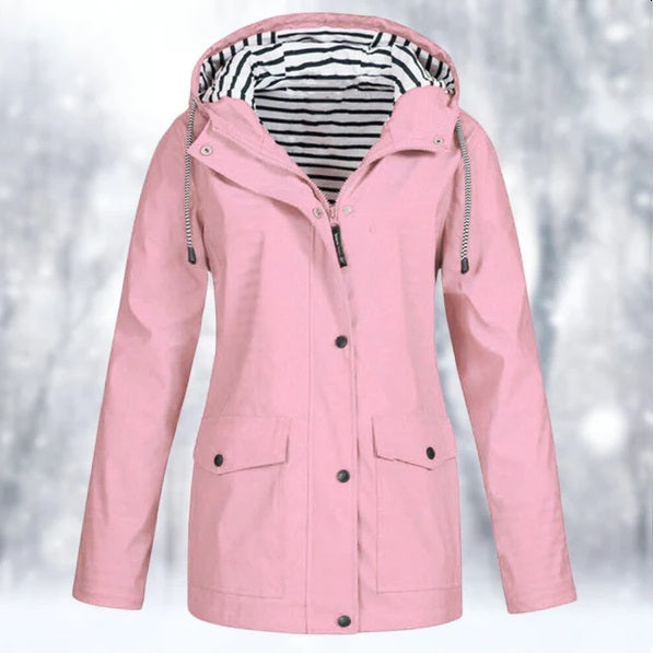 Comfortable women's all-weather raincoat with adjustable hood. Waterproof and breathable for outdoor adventures.