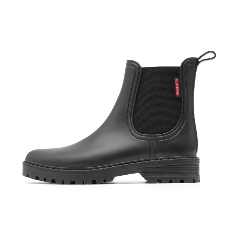 Stylish women's black Chelsea boots, insulated and waterproof for ultimate warmth.