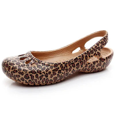 Durable women's waterproof jelly slide sandals, flat and comfortable with an elegant cut-out.