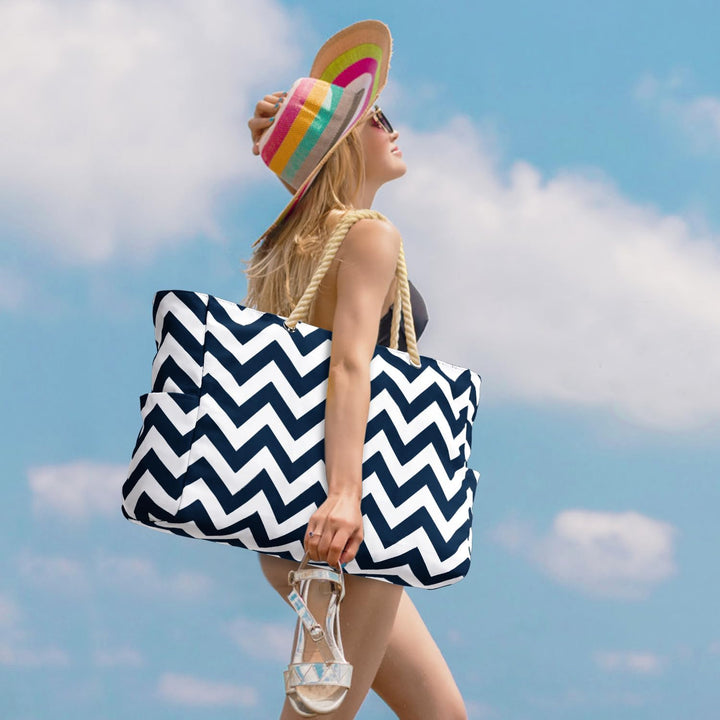 Stylish large waterproof tote for women, zippered main compartment, versatile for travel.