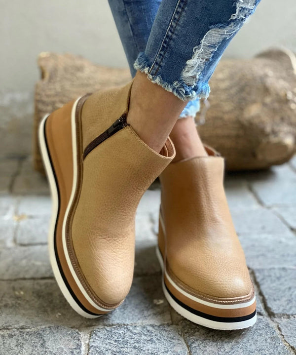 Comfortable women's orthopedic ankle boots, waterproof and durable for everyday winter and fall adventures.