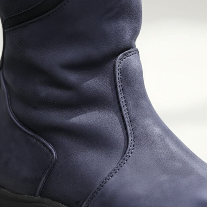 Waterproof women's tall winter boots with orthopedic comfort & sturdy lug sole for support.