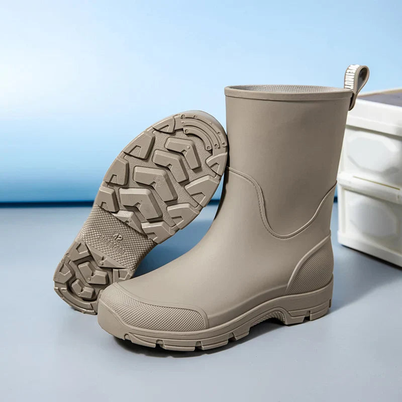 Stylish women's rain boots crafted from durable waterproof rubber, perfect for muddy outdoor activities and comfort