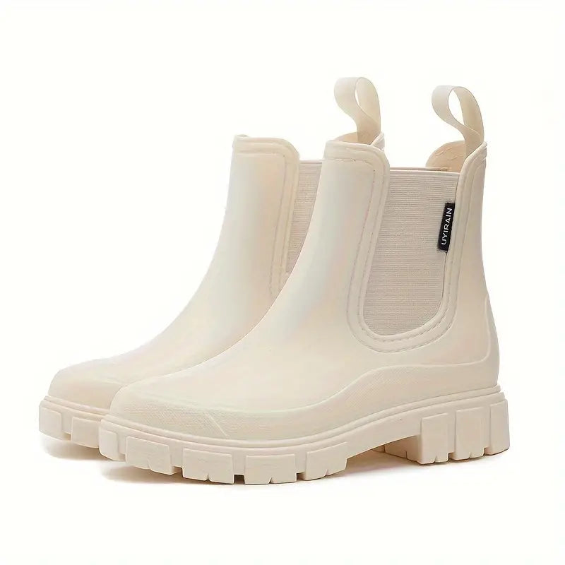 Close-up of a women's waterproof slip-on Chelsea boot, showing elastic side panel, ankle height