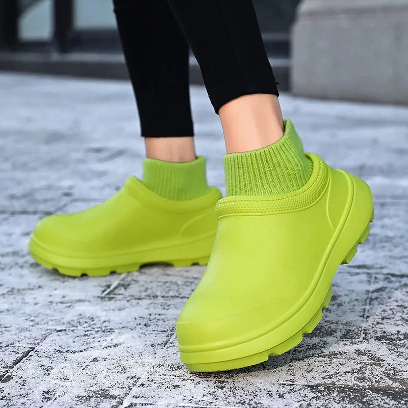 Side profile of Madeline women's waterproof clogs with a cozy knitted ankle cuff and sturdy sole.