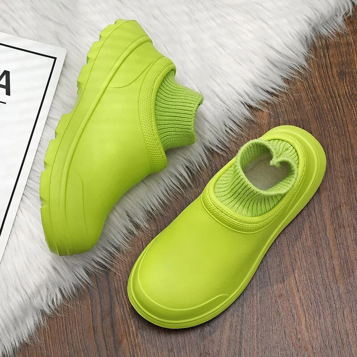 All-weather women's footwear: slip-on waterproof clogs with a unique knitted ankle cuff.