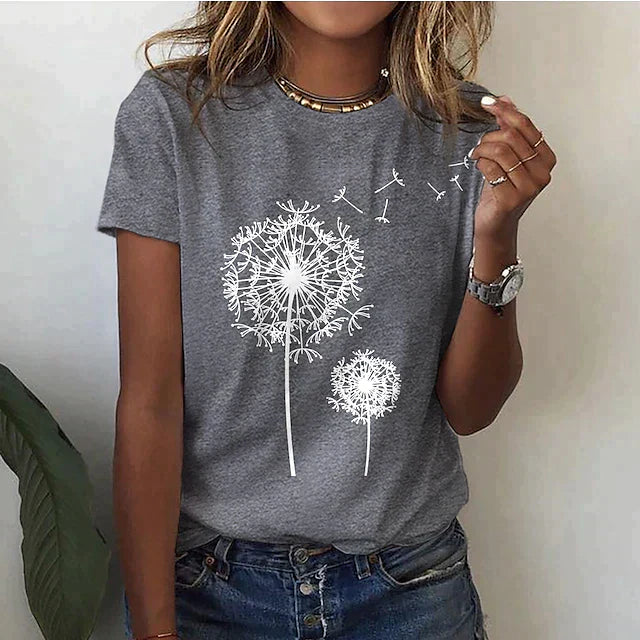 Women's white dandelion graphic tee. Short sleeve crew neck top for casual summer fashion & everyday comfort.