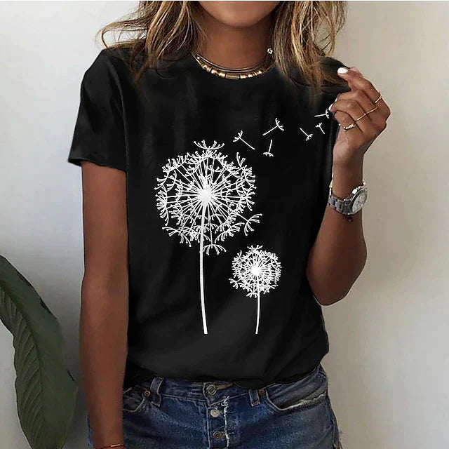 Relaxed fit women's t-shirt with artistic dandelion print. Plus size friendly, cute short sleeve graphic tee.
