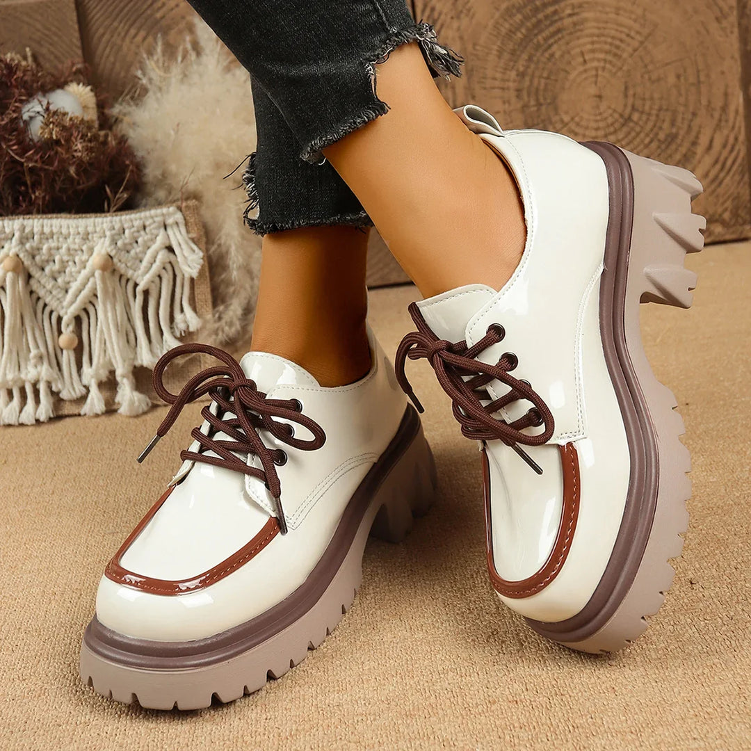 Fashionable women's blue platform sneakers, designed with a shock-absorbing sole for support